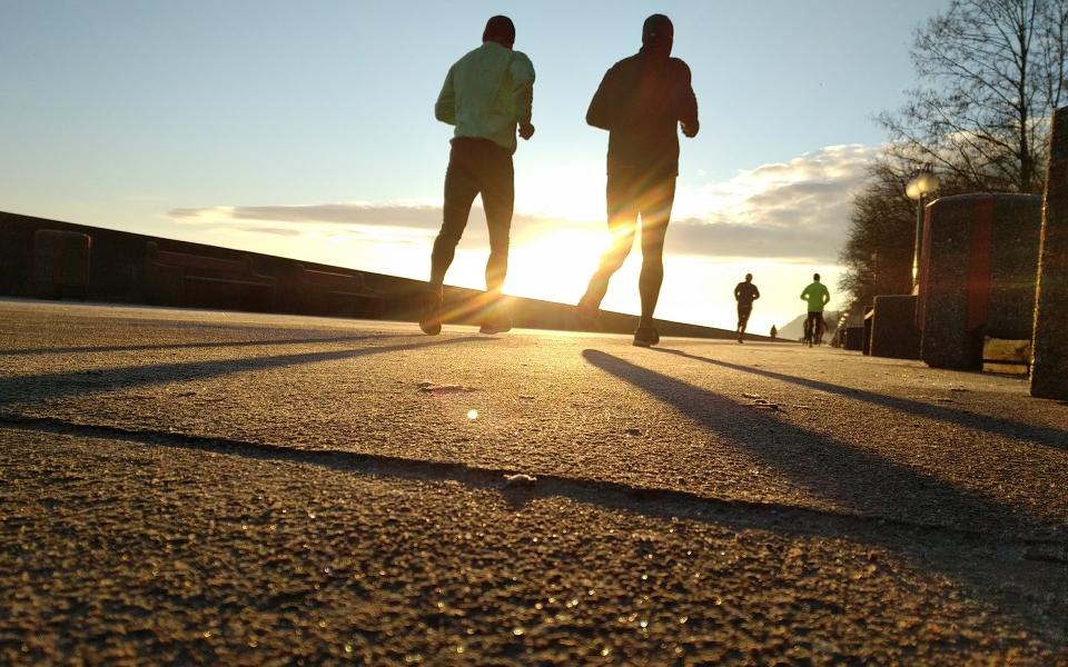 Runners at sunrise